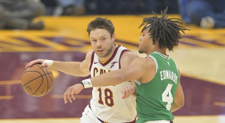 Oct 15, 2019; Cleveland, OH, USA; Cleveland Cavaliers guard Matthew Dellavedova (18) drives against Boston Celtics guard Carsen Edwards (4) in the first quarter at Rocket Mortgage FieldHouse. Mandatory Credit: David Richard-USA TODAY Sports Oct 15, 2019; Cleveland, OH, USA; Cleveland Cavaliers guard Matthew Dellavedova (18) drives against Boston Celtics guard Carsen Edwards (4) in the first quarter at Rocket Mortgage FieldHouse. Mandatory Credit: David Richard-USA TODAY Sports