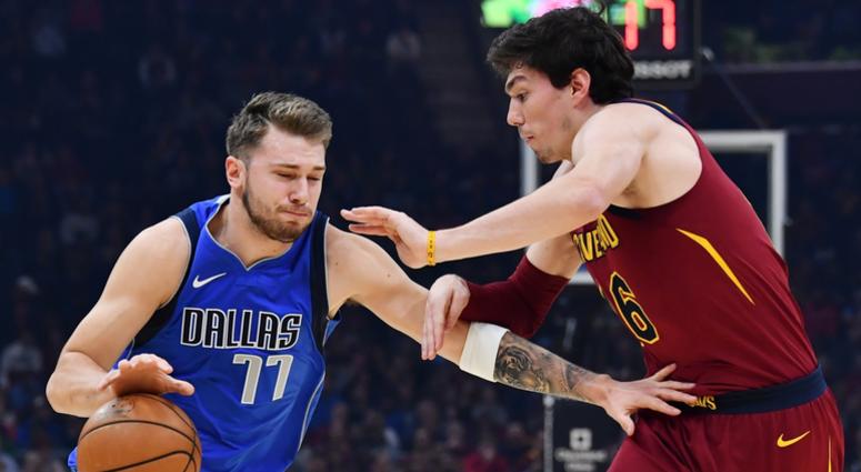 Nov 3, 2019; Cleveland, OH, USA; Dallas Mavericks guard Luka Doncic (77) drives to the basket against Cleveland Cavaliers forward Cedi Osman (16) during the first half at Rocket Mortgage FieldHouse. Mandatory Credit: Ken Blaze-USA TODAY Sports Nov 3, 2019; Cleveland, OH, USA; Dallas Mavericks guard Luka Doncic (77) drives to the basket against Cleveland Cavaliers forward Cedi Osman (16) during the first half at Rocket Mortgage FieldHouse. Mandatory Credit: Ken Blaze-USA TODAY Sports
