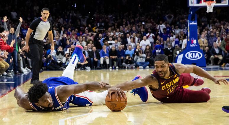 Nov 12, 2019; Philadelphia, PA, USA; Philadelphia 76ers center Joel Embiid (21) dives for a loose ball past Cleveland Cavaliers center Tristan Thompson (13) in the final second of the game at Wells Fargo Center. Mandatory Credit: Bill Streicher-USA TODAY Nov 12, 2019; Philadelphia, PA, USA; Philadelphia 76ers center Joel Embiid (21) dives for a loose ball past Cleveland Cavaliers center Tristan Thompson (13) in the final second of the game at Wells Fargo Center. Mandatory Credit: Bill Streicher-USA TODAY