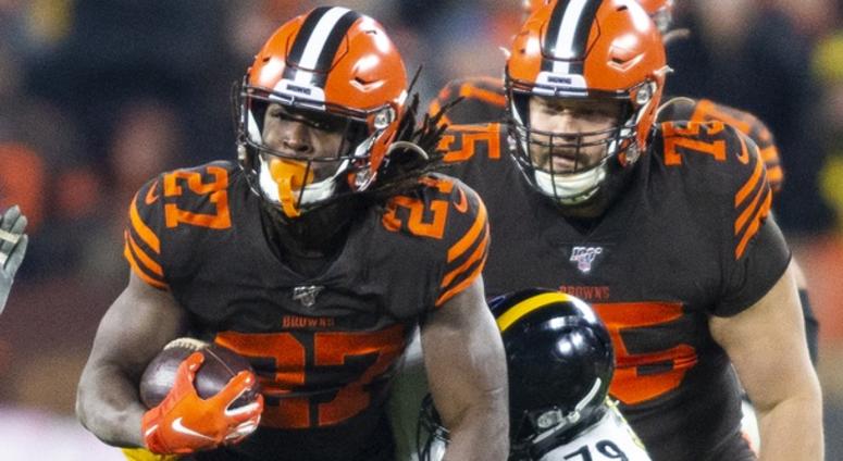Cleveland Browns running back Kareem Hunt (27) runs the ball as Pittsburgh Steelers nose tackle Javon Hargrave (79) tackles m during the first quarter at FirstEnergy Stadium. Cleveland Browns running back Kareem Hunt (27) runs the ball as Pittsburgh Steelers nose tackle Javon Hargrave (79) tackles m during the first quarter at FirstEnergy Stadium.