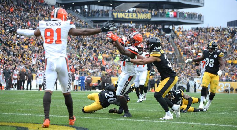Dec 1, 2019; Pittsburgh, PA, USA; Cleveland Browns running back Kareem Hunt (27) scores a touchdown past Pittsburgh Steelers cornerback Cameron Sutton (20) and free safety Minkah Fitzpatrick (39) during the second quarter at Heinz Field. Mandatory Credit: Dec 1, 2019; Pittsburgh, PA, USA; Cleveland Browns running back Kareem Hunt (27) scores a touchdown past Pittsburgh Steelers cornerback Cameron Sutton (20) and free safety Minkah Fitzpatrick (39) during the second quarter at Heinz Field. Mandatory Credit: