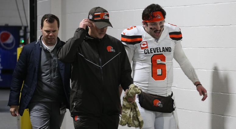 Dec 1, 2019; Pittsburgh, PA, USA; Cleveland Browns quarterback Baker Mayfield (6) returns to the locker room early after suffering an apparent injury to his hand against the Pittsburgh Steelers late in the second quarter at Heinz Field. Mandatory Credit: Dec 1, 2019; Pittsburgh, PA, USA; Cleveland Browns quarterback Baker Mayfield (6) returns to the locker room early after suffering an apparent injury to his hand against the Pittsburgh Steelers late in the second quarter at Heinz Field. Mandatory Credit: