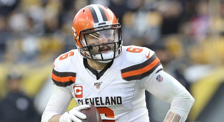 Caption: Dec 1, 2019; Pittsburgh, PA, USA; Cleveland Browns quarterback Baker Mayfield (6) scrambles with the ball against the Pittsburgh Steelers during the fourth quarter at Heinz Field. The Steelers won 20-13. Cleveland Browns quarterback Baker Mayfield