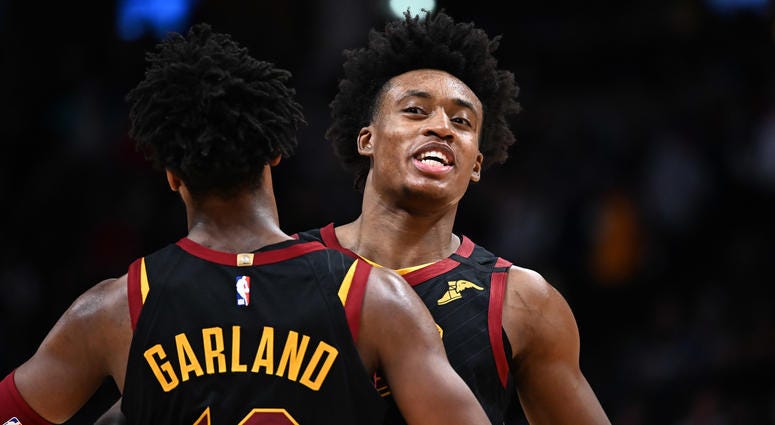 Jan 11, 2020; Denver, Colorado, USA; Cleveland Cavaliers guard Collin Sexton (2) and guard Darius Garland (10) celebrate defeating the against the Denver Nuggets at the Pepsi Center. Cleveland Cavaliers guard Collin Sexton (2) and guard Darius Garland (10)