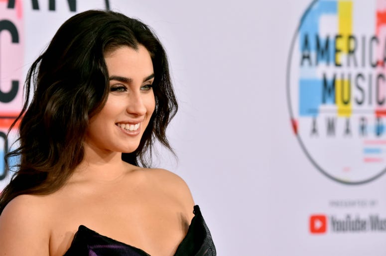 Lauren Jauregui Lauren Jauregui attends the 2018 American Music Awards at Microsoft Theater on October 9, 2018 in Los Angeles, California.