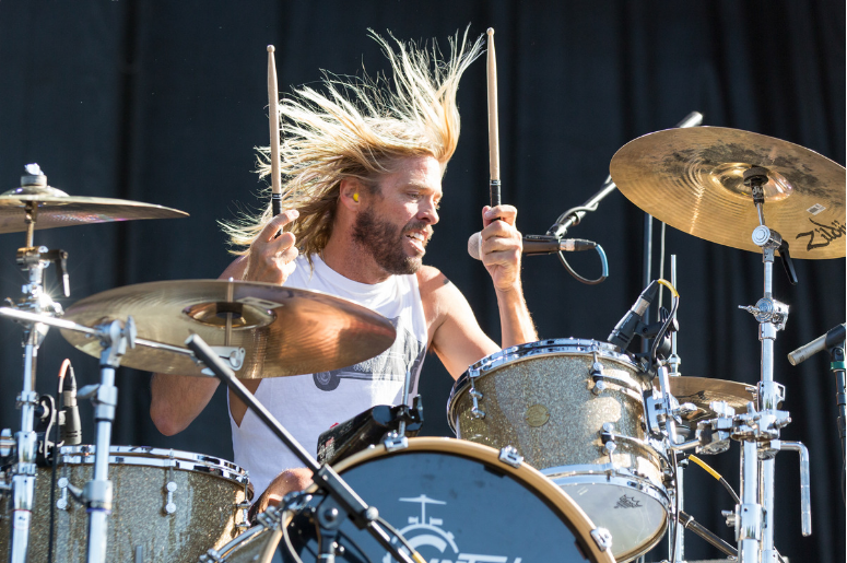 Drummer Taylor Hawkins of Foo Fighters perform as Chevy Metal at Douglas Park during Riot Fest Music Festival Drummer Taylor Hawkins of Foo Fighters perform as Chevy Metal at Douglas Park during Riot Fest Music Festival