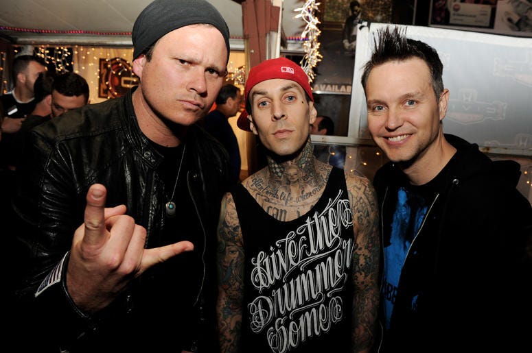 Musicians Tom DeLonge, Travis Barker and Mark Hoppus of blink-182 pose at a press party of announce the 2011 Honda Civic Tour featuring blink-182 Musicians Tom DeLonge, Travis Barker and Mark Hoppus of blink-182 pose at a press party of announce the 2011 Honda Civic Tour featuring blink-182