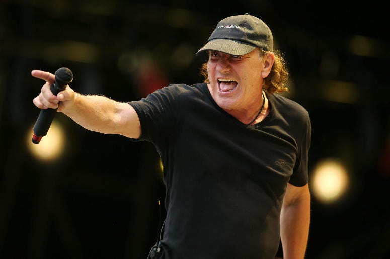Brian Johnson of AC/DC performs on stage in 2015 Brian Johnson of AC/DC performs on stage in 2015