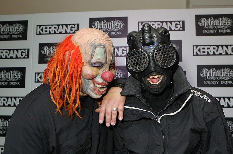Clown and Sid of Slipknot pose in the winners room at The Kerrang! Awards at the Troxy on June 13, 2013 in London, England Clown and Sid of Slipknot pose in the winners room at The Kerrang! Awards at the Troxy on June 13, 2013 in London, England
