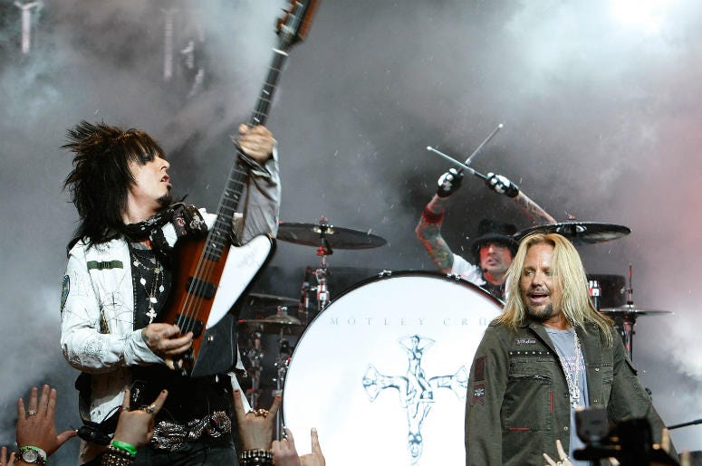 Nikki Sixx, Tommy Lee and singer Vince Neil of Motley Crue perform during a press conference annoucing Crue Fest 2008 Nikki Sixx, Tommy Lee and singer Vince Neil of Motley Crue perform during a press conference annoucing Crue Fest 2008
