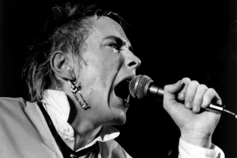 Johnny Rotten of the Sex Pistols performing in 1976 Johnny Rotten of the Sex Pistols performing in 1976