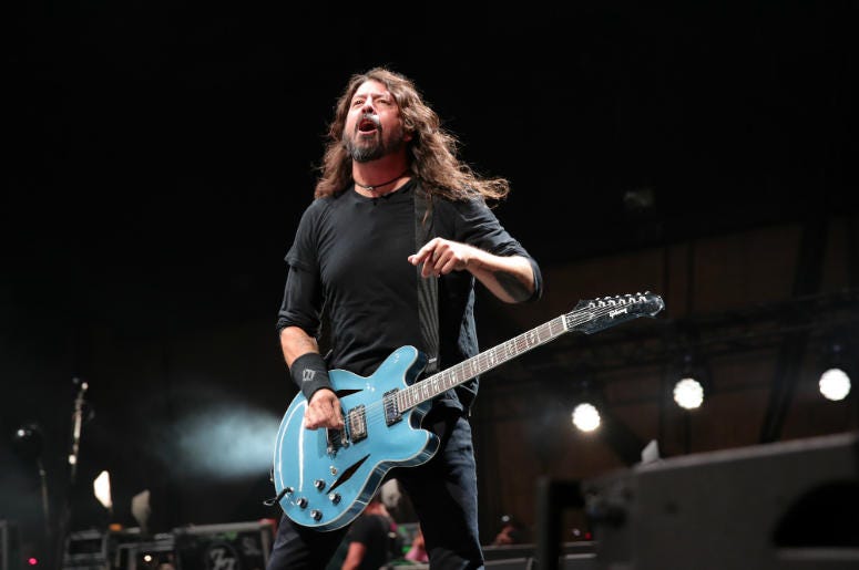 Dave Grohl of 'Foo Fighters' performs on stage during Cal Jam 18 Dave Grohl of 'Foo Fighters' performs on stage during Cal Jam 18
