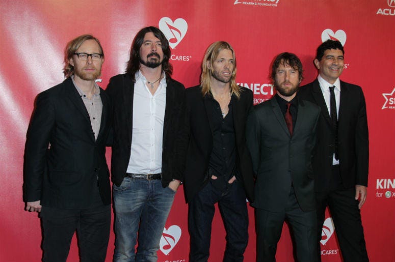 LOS ANGELES - FEB 10: Foo Fighters arrives at the 2012 MusiCares Gala honoring Paul McCartney at LA Convention Center on February 10, 2012 in Los Angeles, CA LOS ANGELES - FEB 10: Foo Fighters arrives at the 2012 MusiCares Gala honoring Paul McCartney at LA Convention Center on February 10, 2012 in Los Angeles, CA