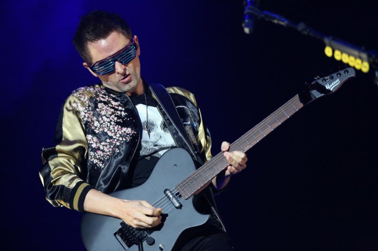 Matt Bellamy of Muse performs during KROQ's Almost Acoustic Christmas Show in Los Angeles, CA Matt Bellamy of Muse performs during KROQ's Almost Acoustic Christmas Show in Los Angeles, CA
