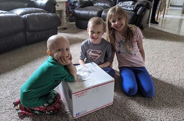 A Casey Cares Family With Their Care Package
