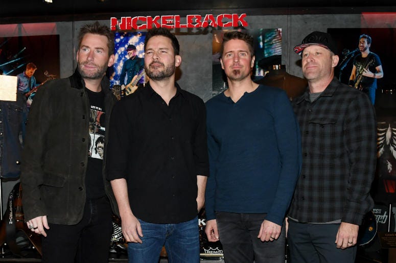 Frontman Chad Kroeger, guitarist Ryan Peake, drummer Daniel Adair and bassist Mike Kroeger of Nickelback Frontman Chad Kroeger, guitarist Ryan Peake, drummer Daniel Adair and bassist Mike Kroeger of Nickelback