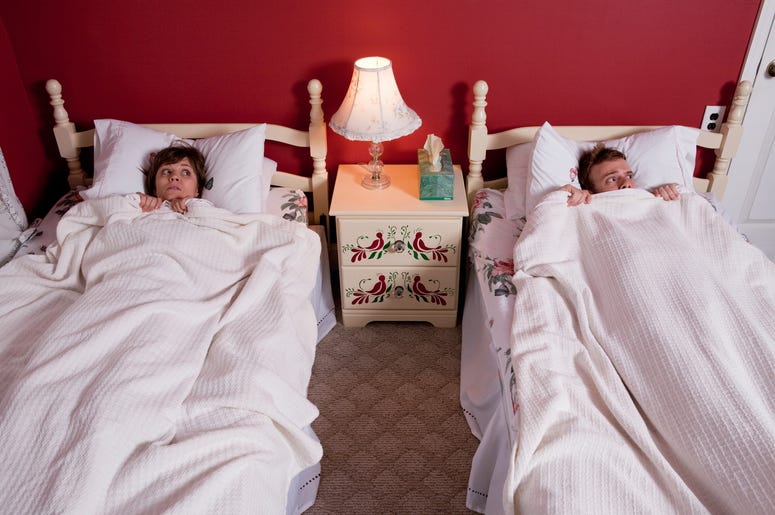 couples sleep in same bed