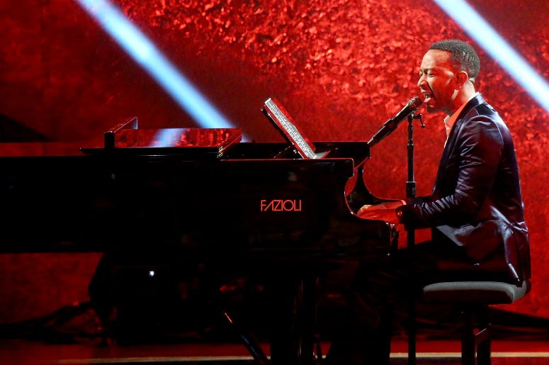 John Legend performs onstage at 'Q 85: A Musical Celebration for Quincy Jones' John Legend performs onstage at 'Q 85: A Musical Celebration for Quincy Jones'