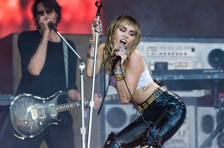 Miley Cyrus performs on the Pyramid stage on day five of Glastonbury Festival Miley Cyrus performs on the Pyramid stage on day five of Glastonbury Festival