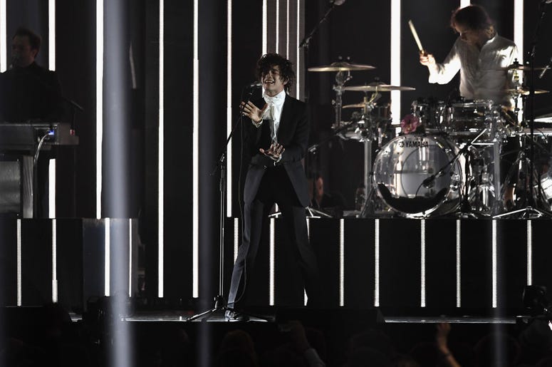 Matthew Healy performs with The 1975 on stage at The BRIT Awards 2017 Matthew Healy performs with The 1975 on stage at The BRIT Awards 2017