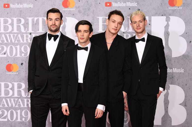 Members of 'The 1975', Matthew Healy, Ross MacDonald, George Daniel and Adam Hann attends The BRIT Awards 2019 held at The O2 Arena on February 20, 2019 in London, England Members of 'The 1975', Matthew Healy, Ross MacDonald, George Daniel and Adam Hann attends The BRIT Awards 2019 held at The O2 Arena on February 20, 2019 in London, England