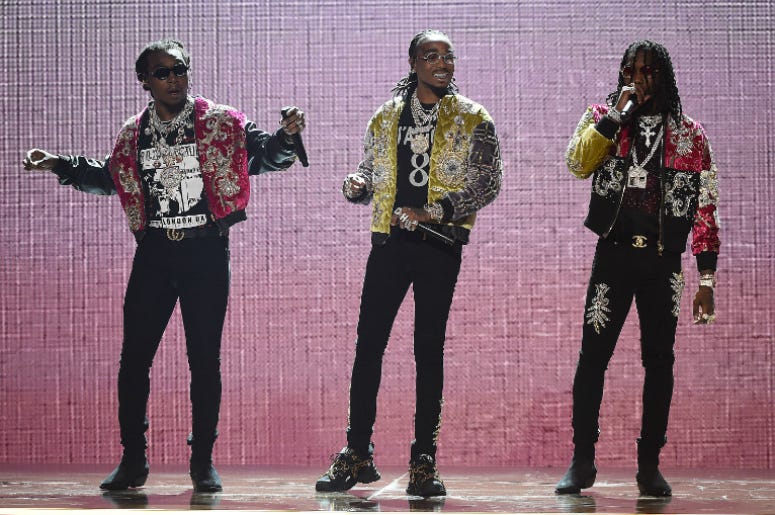 LOS ANGELES - JUNE 24: Migos perform on the 2018 BET Awards at the Microsoft Theater on June 24, 2018 in Los Angeles, California. LOS ANGELES - JUNE 24: Migos perform on the 2018 BET Awards at the Microsoft Theater on June 24, 2018 in Los Angeles, California.