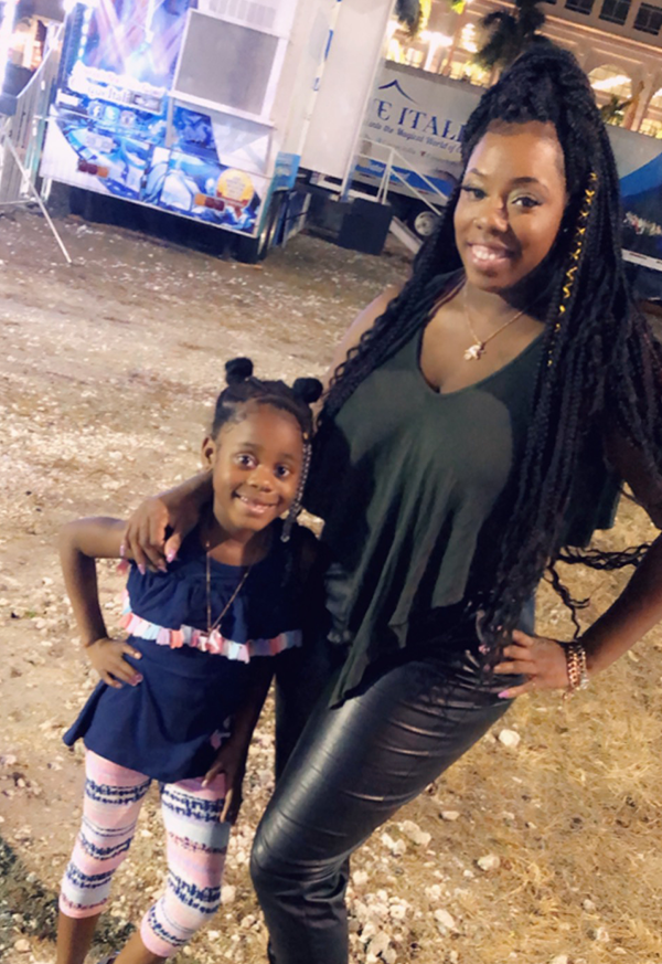 Latasha Brihm poses with the daughter she's taken in Latasha Brihm poses with the daughter she's taken in