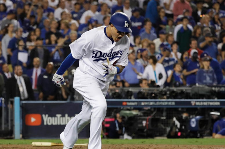 En esta foto de archivo del 26 de octubre de 2018, Manny Machado, de los Dodgers de Los Ángeles, reacciona tras sacar un elevado para cerrar la 10ma entrada en el tercer juego de la Serie Mundial contra los Medias Rojas de Boston, en Los Ángeles. El geren En esta foto de archivo del 26 de octubre de 2018, Manny Machado, de los Dodgers de Los Ángeles, reacciona tras sacar un elevado para cerrar la 10ma entrada en el tercer juego de la Serie Mundial contra los Medias Rojas de Boston, en Los Ángeles. El geren