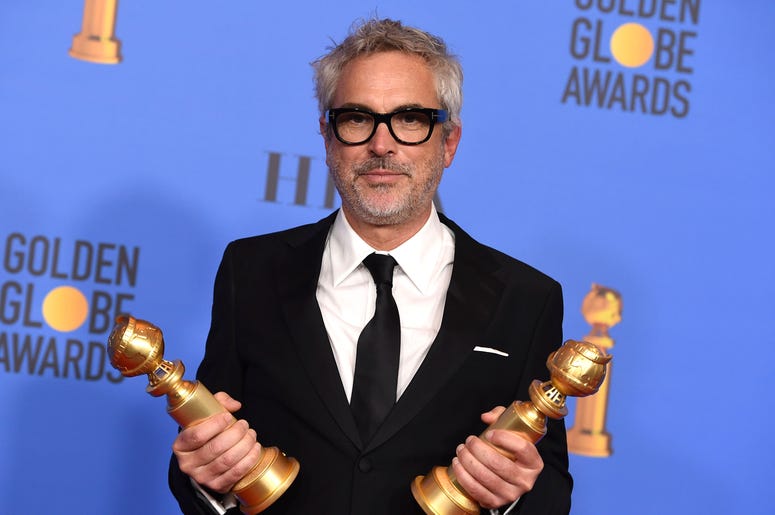 Alfonso Cuarón posa en la sala de prensa tras ganar los Globos de Oro a la mejor cinta en lengua extranjera y a la mejor dirección, por "Roma", el domingo 6 de enero del 2019 en Beverly Hills, California. Alfonso Cuarón posa en la sala de prensa tras ganar los Globos de Oro a la mejor cinta en lengua extranjera y a la mejor dirección, por "Roma", el domingo 6 de enero del 2019 en Beverly Hills, California.