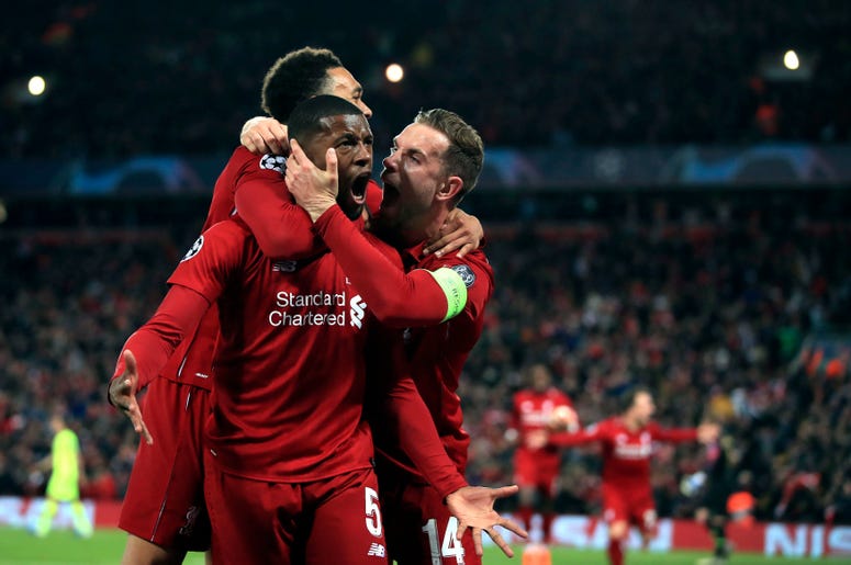 Georginio Wijnaldum (centro de Liverpool) festeja tras anotar el cuarto gol del equipo ante Barcelona en el partido de vuelta de la semifinal de la Liga de Campeones, el martes 7 de 2019. Georginio Wijnaldum (centro de Liverpool) festeja tras anotar el cuarto gol del equipo ante Barcelona en el partido de vuelta de la semifinal de la Liga de Campeones, el martes 7 de 2019.