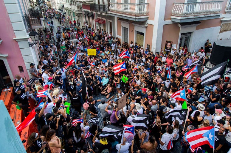 Manifestantes protestan contra el gobernador de Puerto Rico, Ricardo Rosselló, en San Juan, Puerto Rico, el domingo 21 de julio de 2019. Manifestantes protestan contra el gobernador de Puerto Rico, Ricardo Rosselló, en San Juan, Puerto Rico, el domingo 21 de julio de 2019.