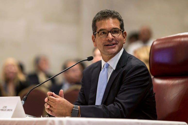 El postulado a secretario de Estado de Puerto Rico, Pedro Pierluisi, arriba a su audiencia de confirmación en la Cámara de Representantes, San Juan, Puerto Rico, viernes 2 de agosto de 2019. De ser confirmado, será nuevo gobernador de la isla al dimitir e El postulado a secretario de Estado de Puerto Rico, Pedro Pierluisi, arriba a su audiencia de confirmación en la Cámara de Representantes, San Juan, Puerto Rico, viernes 2 de agosto de 2019. De ser confirmado, será nuevo gobernador de la isla al dimitir e