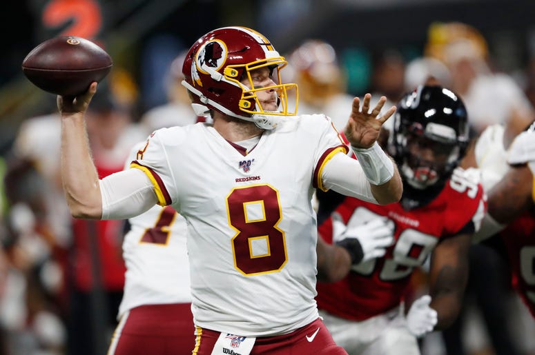 El quarterback de los Redskins de Washington, Case Keenum (8), se prepara para lanzar un pase contra los Falcons de Atlanta durante la primera mitad de un juego de pretemporada de la NFL, el jueves 22 de agosto de 2019, en Atlanta. El quarterback de los Redskins de Washington, Case Keenum (8), se prepara para lanzar un pase contra los Falcons de Atlanta durante la primera mitad de un juego de pretemporada de la NFL, el jueves 22 de agosto de 2019, en Atlanta.