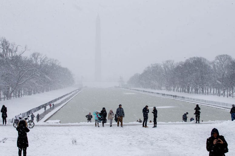 WASHINGTON, DC - JANUARY 13: People visit the Lincoln Memorial on January 13, 2019 in Washington, DC. The DC area was hit with 4-7 inches of snow accumulation with the potential of another 2-4 inches. WASHINGTON, DC - JANUARY 13: People visit the Lincoln Memorial on January 13, 2019 in Washington, DC. The DC area was hit with 4-7 inches of snow accumulation with the potential of another 2-4 inches.