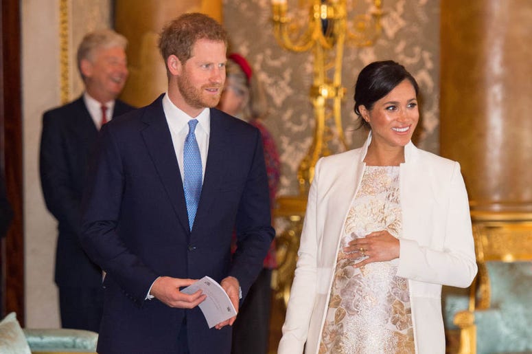 Meghan, Duchess of Sussex and Prince Harry, Duke of Sussex attend a reception to mark the fiftieth anniversary of the investiture of the Prince of Wales at Buckingham Palace on March 5, 2019 in London, England. Meghan, Duchess of Sussex and Prince Harry, Duke of Sussex attend a reception to mark the fiftieth anniversary of the investiture of the Prince of Wales at Buckingham Palace on March 5, 2019 in London, England.