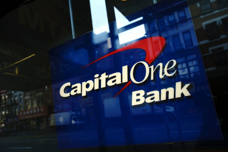 Capital One signage adorns a window of a Capital One bank in the Lower East Side of Manhattan on July 30, 2019 in New York City. In one of the largest-ever thefts of bank data, a software engineer in Seattle was arrested for hacking into a Capitol One ser Capital One signage adorns a window of a Capital One bank in the Lower East Side of Manhattan on July 30, 2019 in New York City. In one of the largest-ever thefts of bank data, a software engineer in Seattle was arrested for hacking into a Capitol One ser