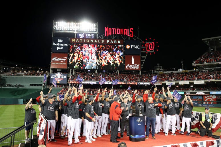 The Washington Nationals celebrate winning game four and the National League Championship Series against the St. Louis Cardinals at Nationals Park on October 15, 2019 in Washington, DC. The Washington Nationals celebrate winning game four and the National League Championship Series against the St. Louis Cardinals at Nationals Park on October 15, 2019 in Washington, DC.