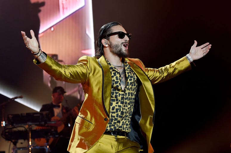 Singer Maluma performs during his "F.A.M.E. Tour" at The Forum on April 7, 2018 in Inglewood, California. Singer Maluma performs during his "F.A.M.E. Tour" at The Forum on April 7, 2018 in Inglewood, California.