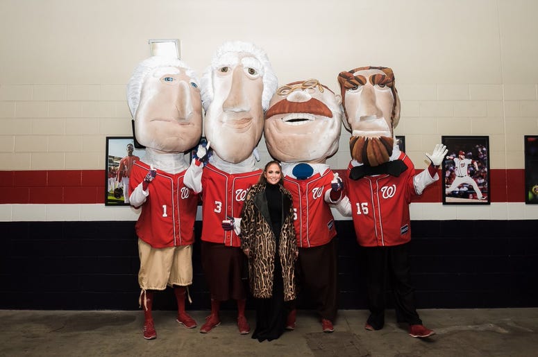 Jennifer Lopez with the Racing Presidents at Nationals Park in Washington, D.C. Jennifer Lopez with the Racing Presidents at Nationals Park in Washington, D.C.