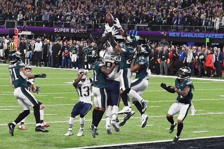 Feb 4, 2018; Minneapolis, MN, USA; New England Patriots tight end Rob Gronkowski (87) is unable to make the catch on the final play of Super Bowl LII as Philadelphia Eagles cornerback Jalen Mills (31) and free safety Rodney McLeod (23) and cornerback Jayl
