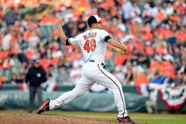 Baltimore Orioles pitcher Richard Bleier (48) throws a pitch in the eleventh inning against the Minnesota Twins at Oriole Park at Camden Yards.