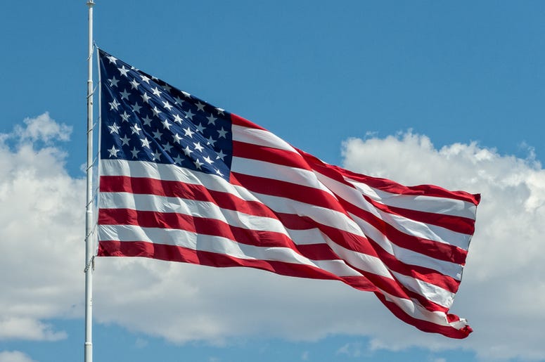 United States flag against sky