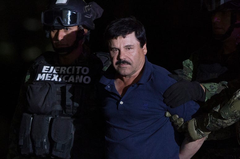 Joaquin "El Chapo" Guzman in handcuffs