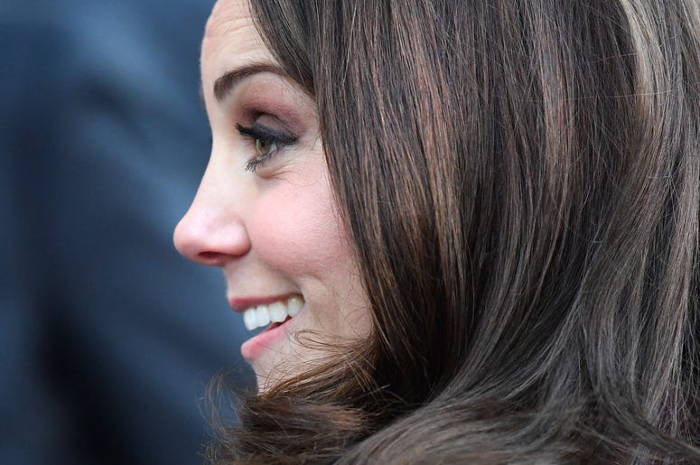 Kate Middleton smiles in profile