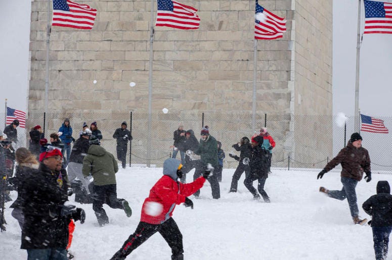 WASHINGTON, DC - JANUARY 13: People take part in the 'Snowdown Snowballs' at the Washington Monument on January 13, 2019 in Washington, DC. The DC area was hit with 4-7 inches of snow accumulation with the potential of another 2-4 inches. WASHINGTON, DC - JANUARY 13: People take part in the 'Snowdown Snowballs' at the Washington Monument on January 13, 2019 in Washington, DC. The DC area was hit with 4-7 inches of snow accumulation with the potential of another 2-4 inches.