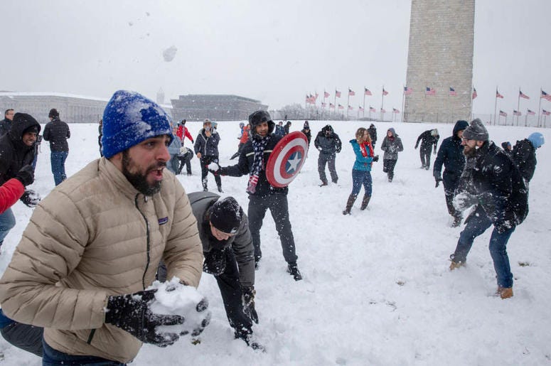 WASHINGTON, DC - JANUARY 13: People take part in the 'Snowdown Snowballs' at the Washington Monument on January 13, 2019 in Washington, DC. The DC area was hit with 4-7 inches of snow accumulation with the potential of another 2-4 inches. WASHINGTON, DC - JANUARY 13: People take part in the 'Snowdown Snowballs' at the Washington Monument on January 13, 2019 in Washington, DC. The DC area was hit with 4-7 inches of snow accumulation with the potential of another 2-4 inches.