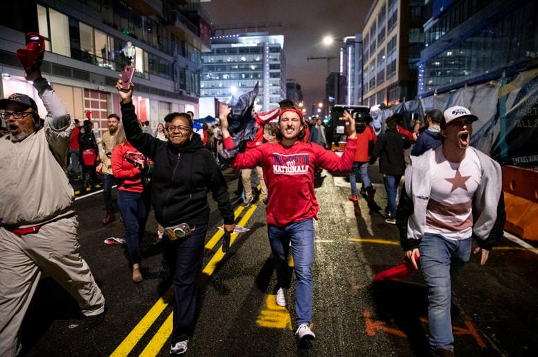 Washington Nationals fans stream into the streets outside of Nationals Park celebrating the Nationals World Series victory on October 30, 2019 in Washington, DC. The Washington Nationals defeated the Houston Astros 6-2 in Game 7 of the World Series bringi Washington Nationals fans stream into the streets outside of Nationals Park celebrating the Nationals World Series victory on October 30, 2019 in Washington, DC. The Washington Nationals defeated the Houston Astros 6-2 in Game 7 of the World Series bringi