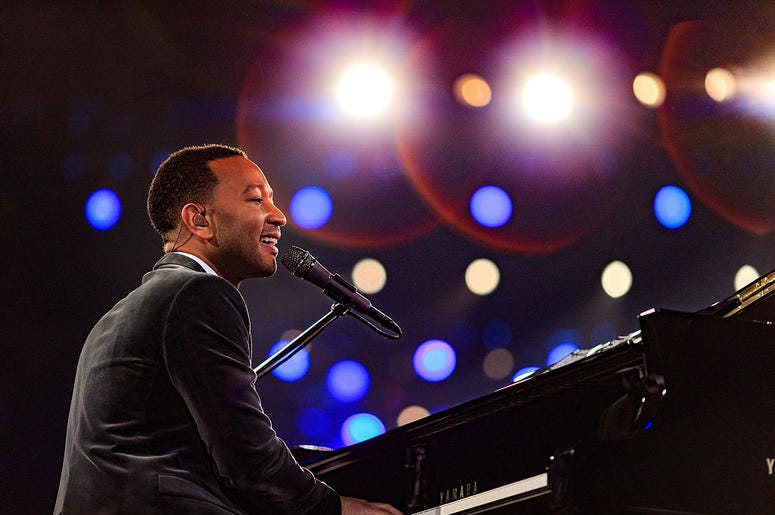 Singer John Legend performs onstage during the 2016 MusiCares Person of the Year honoring Lionel Richie at the Los Angeles Convention Center on February 13, 2016 in Los Angeles, California. Singer John Legend performs onstage during the 2016 MusiCares Person of the Year honoring Lionel Richie at the Los Angeles Convention Center on February 13, 2016 in Los Angeles, California.