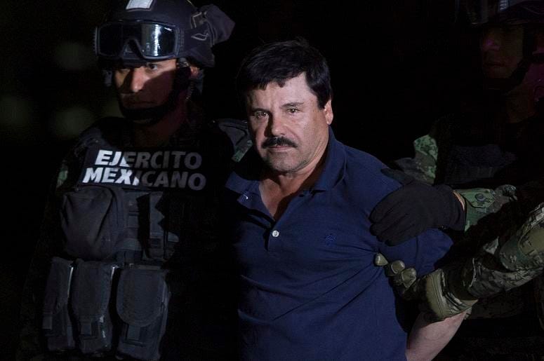 Joaquin "El Chapo" Guzman in handcuffs