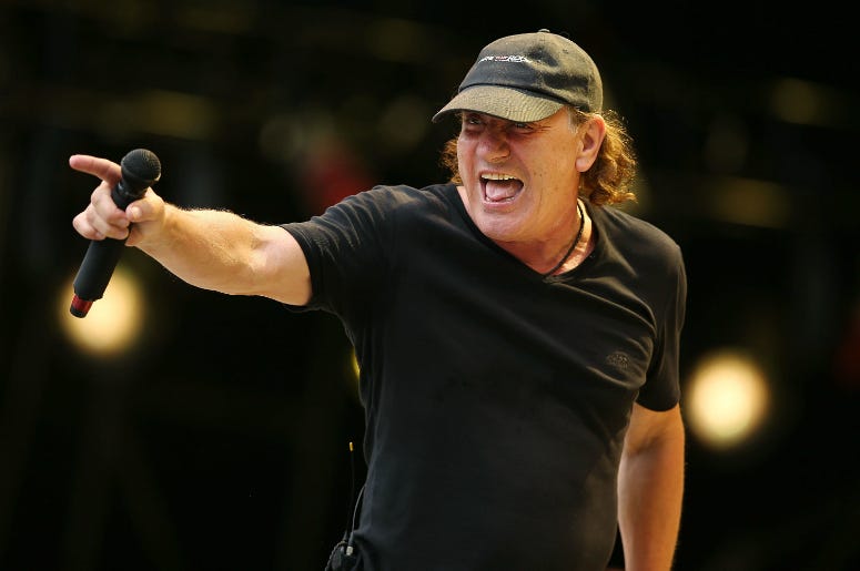 Brian Johnson of AC/DC performs on stage in 2015 Brian Johnson of AC/DC performs on stage in 2015